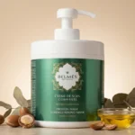 Pot crème de soin coiffante Belmés Profissional anti-frisottis sans rinçage – noix d'argan ouvertes bol d'huile dorée et feuilles d'eucalyptus en arrière-plan