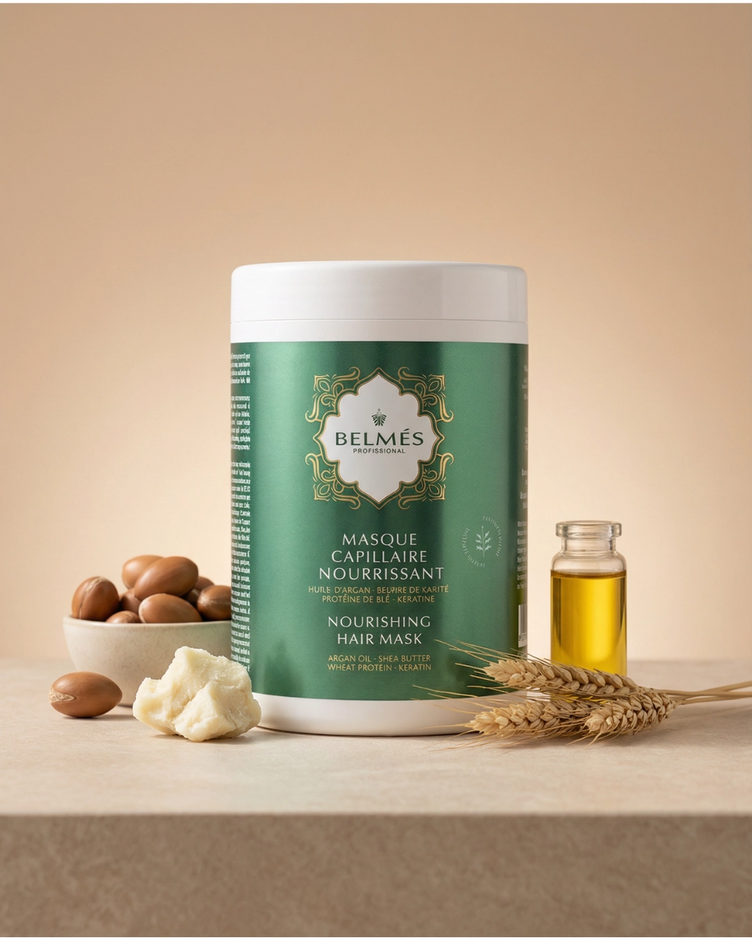 Pot masque capillaire nourrissant Belmés Profissional – noix d'argan beurre de karité épis de blé et flacon d'huile dorée en arrière-plan