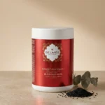 Pot masque à la nigelle Belmés Profissional – graines de nigelle noires et feuilles d'eucalyptus en arrière-plan tous types de peau